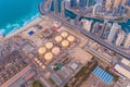 Aerial view of petrochemical oil refinery and sea in industrial engineering and energy concept in Dubai, urban city, UAE. Oil and