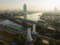 Aerial view of Phra Buddha Yodfa Bridge, Memorial Bridge and Phra Pok Klao Bridge over the Chaophraya River at sunrise scene
