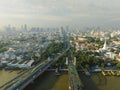 Aerial view of Phra Buddha Yodfa Bridge, Memorial Bridge and Phra Pok Klao Bridge over the Chaophraya River at sunrise scene