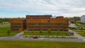 Aerial view of Physicum University of Tartu surrounded by growing trees Royalty Free Stock Photo