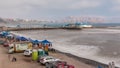 Aerial view of the Pier taken from the pebble beach. Restaurant is located at the end of the pier timelapse. Miraflores