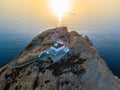 Aerial view of the Pietra Lighthouse and the Genoese tower at sunset. Red Island, Corsica, France Royalty Free Stock Photo