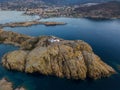 Aerial view of the Pietra Lighthouse and the Genoese tower at sunset. Red Island, Corsica, France Royalty Free Stock Photo