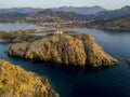 Aerial view of the Pietra Lighthouse and the Genoese tower at sunset. Red Island, Corsica, France Royalty Free Stock Photo