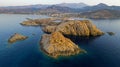 Aerial view of the Pietra Lighthouse and the Genoese tower at sunset. Red Island, Corsica, France Royalty Free Stock Photo