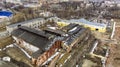 Aerial view of pitiful remnants of huge complex of buildings of old plant