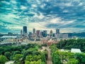 Aerial view of Pittsburgh downtown skyline with bridges on under dramatic sky