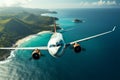 Aerial view Plane soars above ocean, overlooking a distant island Royalty Free Stock Photo