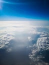 Aerial view from plane to morning sunrise over clouds Royalty Free Stock Photo