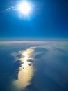 Aerial view from plane to morning sunrise over the ocean Royalty Free Stock Photo