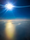 Aerial view from plane to morning sunrise over the ocean Royalty Free Stock Photo