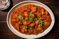 aerial view of a plate of chicken vindaloo