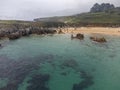 Aerial view on Playa de Toro in Llanes, Green coast of Asturias, North Spain with sandy beaches, cliffs, hidden caves, green