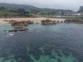 Aerial view on Playa de Toro in Llanes, Green coast of Asturias, North Spain with sandy beaches, cliffs, hidden caves, green