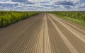 Aerial view of a plowed field ready for sowing. Perfect lines of brown plowed field top view Royalty Free Stock Photo