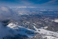 Aerial view of Poiana Brasov ski resort from Postavaru Mountains in Romania. Royalty Free Stock Photo