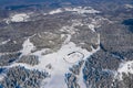 Aerial view of Poiana Brasov ski resort from Postavaru Mountains in Romania. Royalty Free Stock Photo