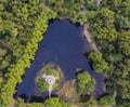 Aerial view pond in park at summer sunny day. Stock. Top view of city Park on the pond