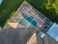 Aerial view of pool screen enclosure surrounded by trees Royalty Free Stock Photo