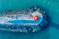 Aerial view of Poolbeg Lighthouse the famous red landmark in Dublin Harbor Ireland seen by drone at sunset Royalty Free Stock Photo