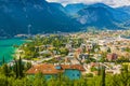 Aerial view at the popular touristic landmark Riva del Garda village at lake Garda, Italy. on a beautiful summer day Royalty Free Stock Photo