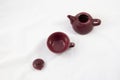 Aerial view of a porcelain teapot on white background.