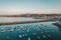 Aerial view of a port with boats and and yachts in a small village in France Royalty Free Stock Photo