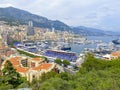 Aerial view of Port Hercule, marina and harbor for boats, luxury yachts and cruise ships in Monaco, Monte Carlo. Royalty Free Stock Photo