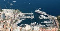 Aerial view of port Hercule of the Principality Monaco at sunny day, Monte-Carlo, view point in La Turbie, Megayachts, a