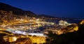 Aerial view of port Hercules in Monaco - Monte-Carlo at dusk, a lot of yachts and boats are moored in marina, cityscape Royalty Free Stock Photo