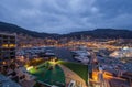 Aerial view of port Hercules in Monaco - Monte-Carlo at dusk, a lot of yachts and boats are moored in marina, cityscape Royalty Free Stock Photo