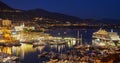 Aerial view of port Hercules in Monaco - Monte-Carlo at dusk, a lot of yachts and boats are moored in marina, cityscape Royalty Free Stock Photo