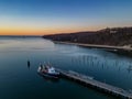 Aerial view of the Port Jefferson Harbor during a beautiful and cloudless sunset in the winter Royalty Free Stock Photo