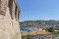 Aerial view of Porto Santo Stefano harbor from the Spanish fortress on a sunny day, Grosseto, Italy Royalty Free Stock Photo