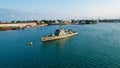 Aerial view of a Portuguese ship, named Zaire, sailing across the open ocean on a sunny day.