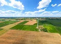 Aerial view of powerful Wind turbine farm for energy production on beautiful cloudy sky at highland. Wind power turbines Royalty Free Stock Photo