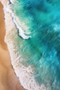 aerial view of a pristine, deserted beach with turquoise waves Royalty Free Stock Photo