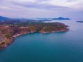 Aerial view of Promthep Cape viewpoint at sunset with Andaman sea in Phuket Island, tourist attraction in Thailand in travel trip Royalty Free Stock Photo