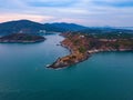 Aerial view of Promthep Cape viewpoint at sunset with Andaman sea in Phuket Island, tourist attraction in Thailand in travel trip Royalty Free Stock Photo
