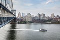 Aerial view of public transportation boat riding on East River