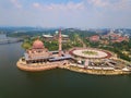 Aerial view of Putra mosque with garden landscape design and Putrajaya Lake, Putrajaya. The most famous tourist attraction in