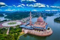 Aerial View Of Putra Mosque with Putrajaya City Centre with Lake at sunset in Putrajaya, Malaysia