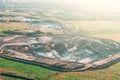 Aerial view of quarry landscape, industrial limestone mining excavators and other equipment