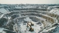 Aerial view of a quarry in winter with excavators and workers Royalty Free Stock Photo
