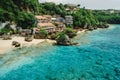 Aerial view of quiet ocean and coastline with cozy hotels on Impossibles beach in Bali island