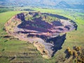 Volcanic crater of Racos village, Transylvania, Romania - drone view