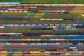 Aerial view of rail sorting freight station with railway cars, with many rail tracks railroad. Heavy industry landscape on evening Royalty Free Stock Photo