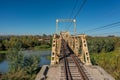 Aerial view of the railroad bridge above a river in Maule region, Chile. Top view of the railroad from drone Royalty Free Stock Photo