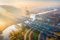 Aerial view of railroad bridge and river in fog at sunrise Royalty Free Stock Photo