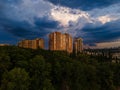 Aerial view on rain clouds at sunset over the city Royalty Free Stock Photo